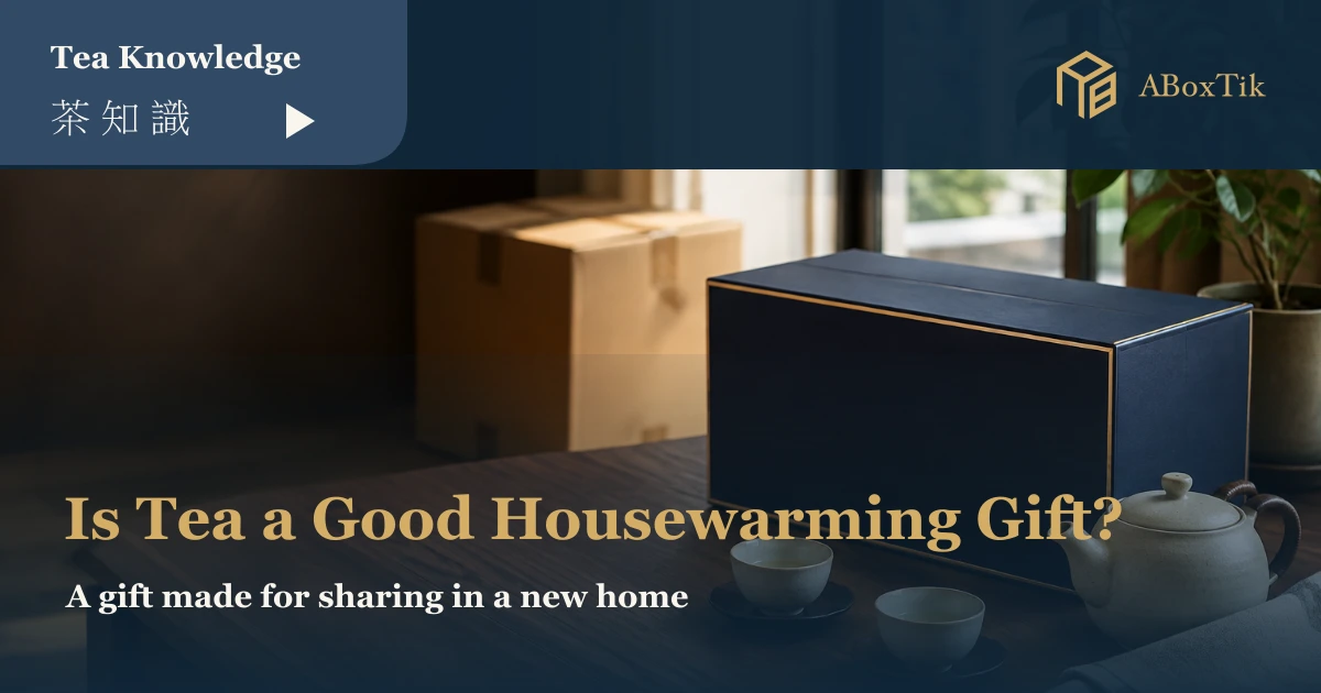 Housewarming tea gift with a teapot and two cups on a new-home table