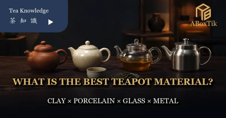 Clay, porcelain, glass and stainless-steel teapots arranged for comparison