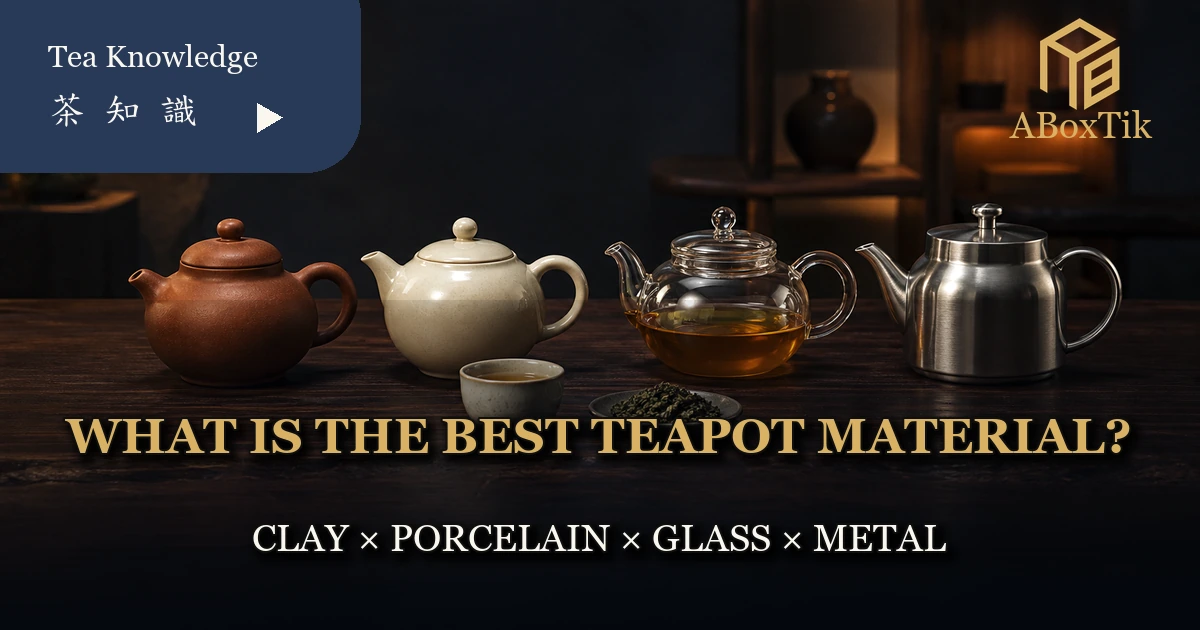 Clay, porcelain, glass and stainless-steel teapots arranged for comparison