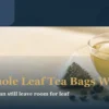 Glass cup and transparent whole leaf pyramid tea bag for a buying guide