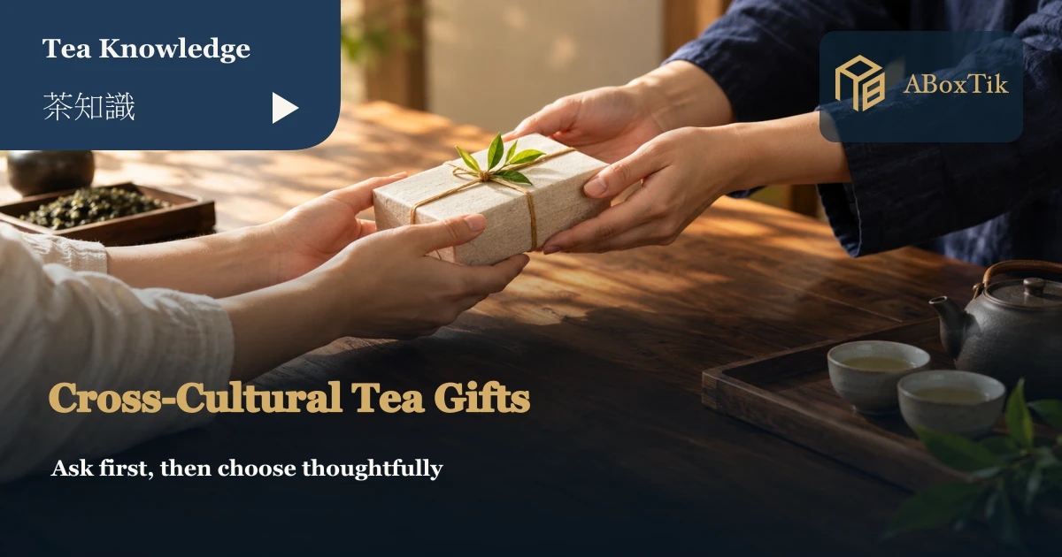 Two people handing over a small wrapped tea gift