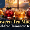 Three Halloween tea mocktails with blackberry, plum and grape, in clear iced glasses on a warm tea table