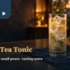 Oolong tea tonic design setting with a sparkling iced drink, cooled tea and a bar spoon
