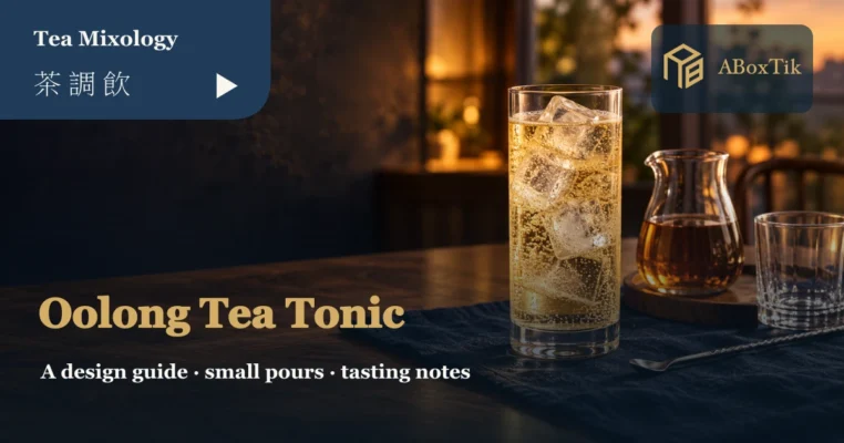 Oolong tea tonic design setting with a sparkling iced drink, cooled tea and a bar spoon