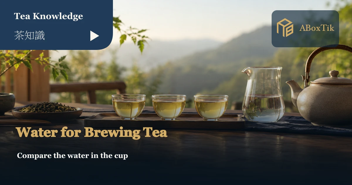 Three cups of tea, a water carafe and teaware