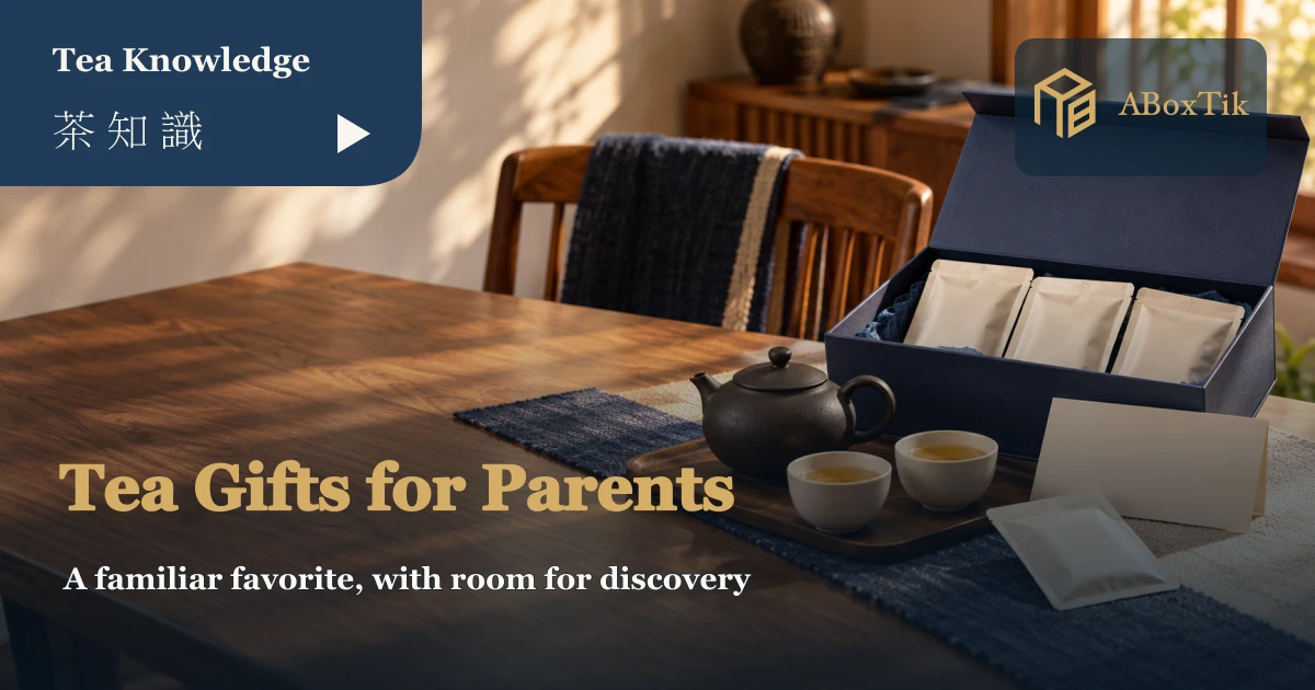 Tea gifts for parents setting with cups, an unbranded gift box and a blank note card