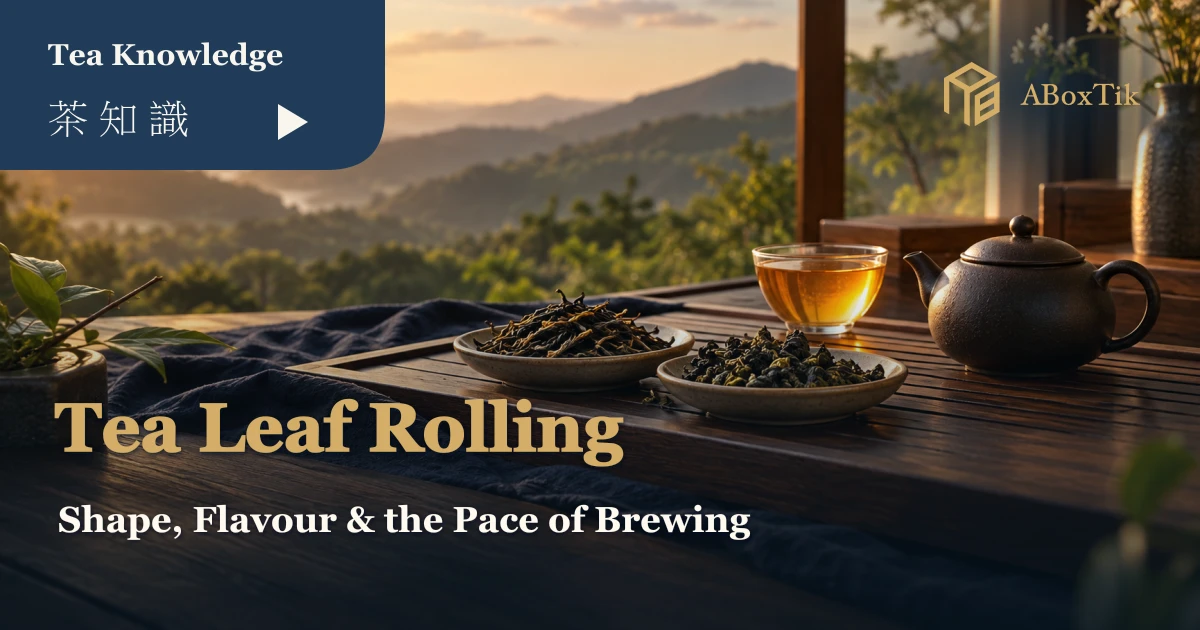 Warm window-side tea setting with twisted and ball-shaped leaves, a ceramic teapot and amber tea