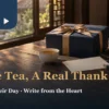 Thank-you tea gifts setting with a navy box, blank card, pen and two tea cups on a walnut table