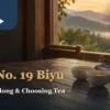 Warm window-side tea setting with a teapot, porcelain cups and the TTES No. 19 Biyu article title